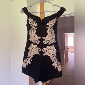 Valiant Paris off the shoulder black shorts romper with lace detail in size S